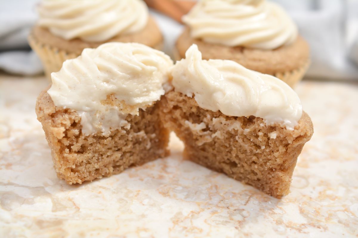 Gingerbread cupcake cut in half.