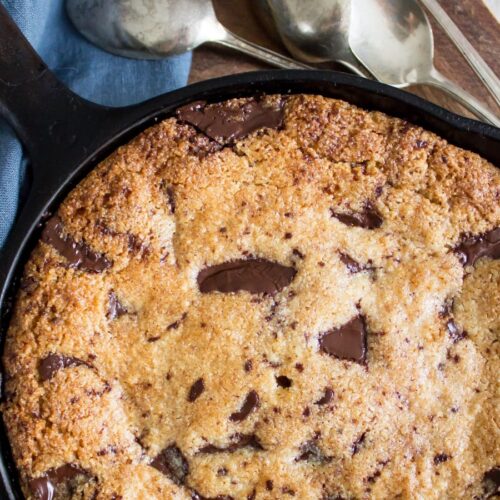 Skillet Chocolate Chip Cookie with a blue napkin.