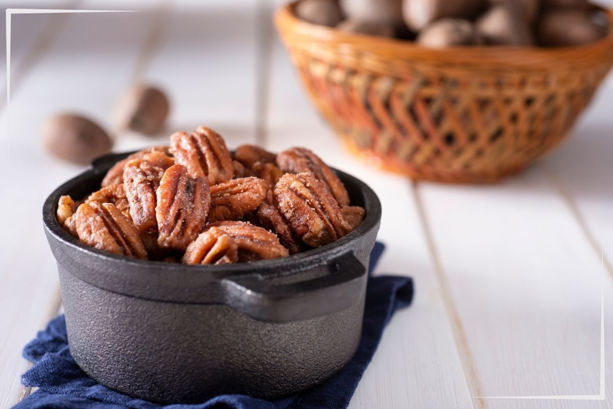 Candied pecans in a bowl.