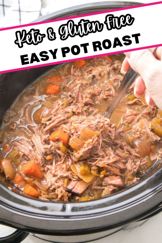 A slow cooker filled with shredded pot roast, carrots, and celery. A hand holds a spoon, stirring the mixture. The dish is labeled "Keto & Gluten Free Easy Pot Roast" at the top of the image.