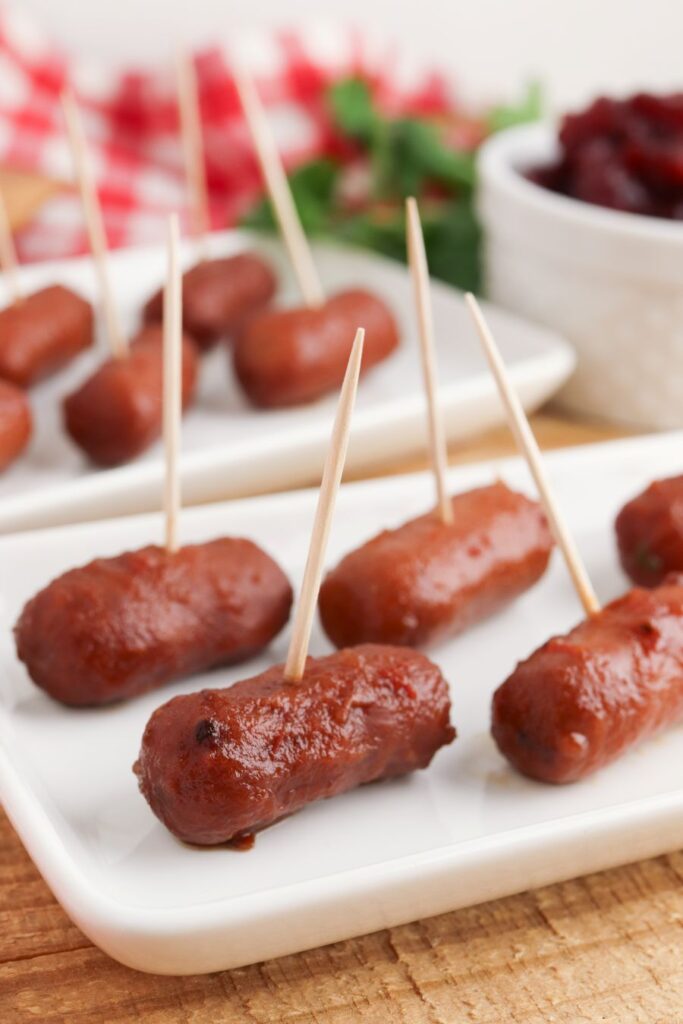 Cocktail sausages on a plate.
