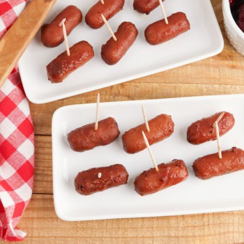 Cocktail sausages on a plate.