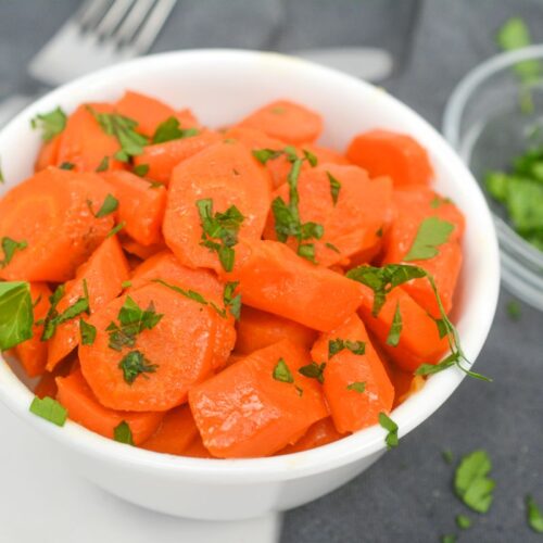Glazed Carrots in a white bowl.
