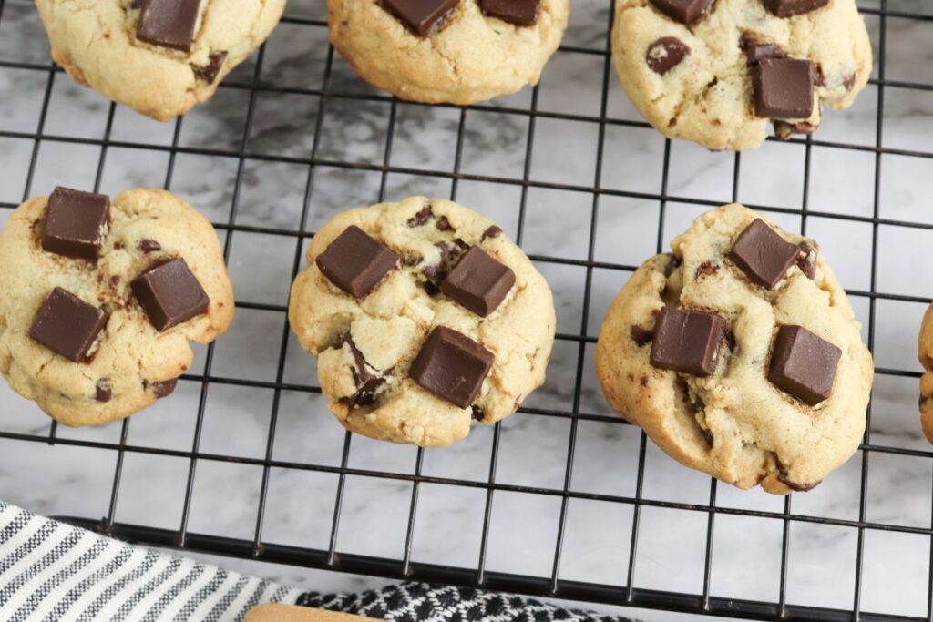 Gluten Free Dark Chocolate Chip Cookies on a wire rack.